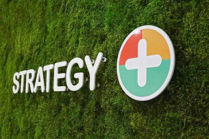 Strategy Plus office branding